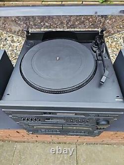 Sanyo Sound System Stereo turntable/cassette player/FM AM/speakers Model DC-X891