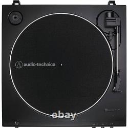 Plateau tournant Audio-Technica AT-LP60X et enceintes blanches Edifier R1280T