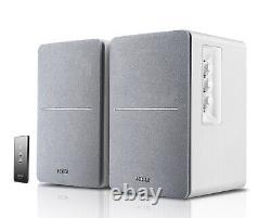 Plateau tournant Audio-Technica AT-LP60X et enceintes blanches Edifier R1280T