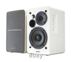 Plateau tournant Audio-Technica AT-LP60X et enceintes blanches Edifier R1280T