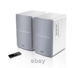 Plateau tournant Audio-Technica AT-LP60X et enceintes blanches Edifier R1280T